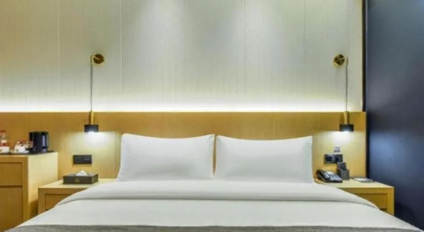 Bed in Borrman Hotel Chongqing Liberation Monument Hongyadong