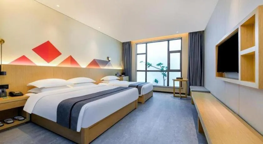 Bed in Borrman Hotel Chongqing Liberation Monument Hongyadong