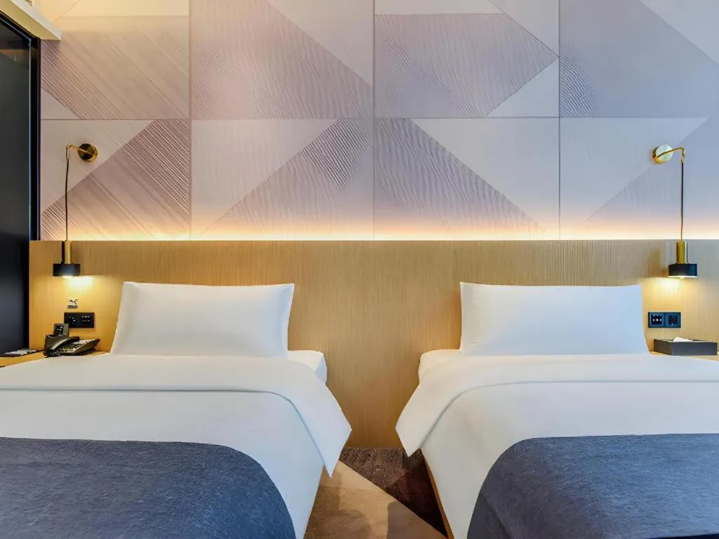 Bed in Borrman Hotel Chongqing Liberation Monument Hongyadong