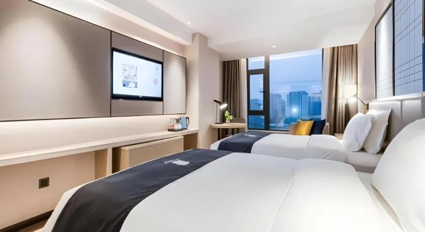 Bed in Echarm Hotel Huzhou Wuyue Plaza Children's Clothing City