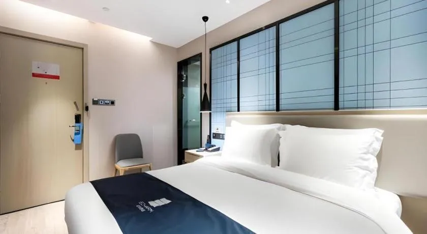 Bed in Echarm Hotel Huzhou Wuyue Plaza Children's Clothing City