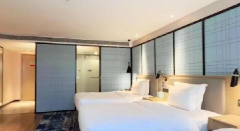 Bed in Echarm Hotel Huzhou Wuyue Plaza Children's Clothing City