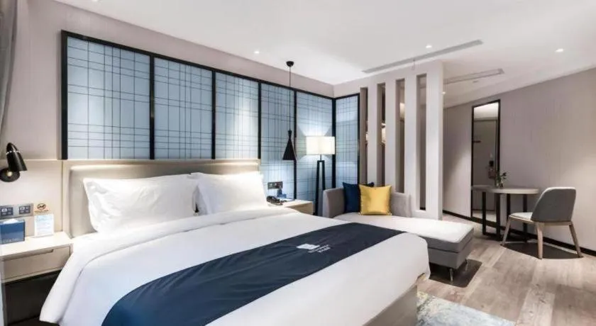 Bed in Echarm Hotel Huzhou Wuyue Plaza Children's Clothing City