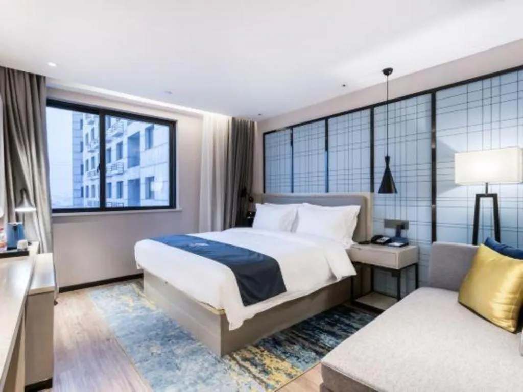 Bed in Echarm Hotel Huzhou Wuyue Plaza Children's Clothing City