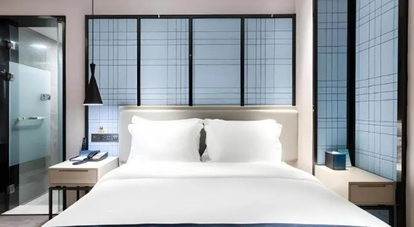 Bed in Echarm Hotel Huzhou Wuyue Plaza Children's Clothing City