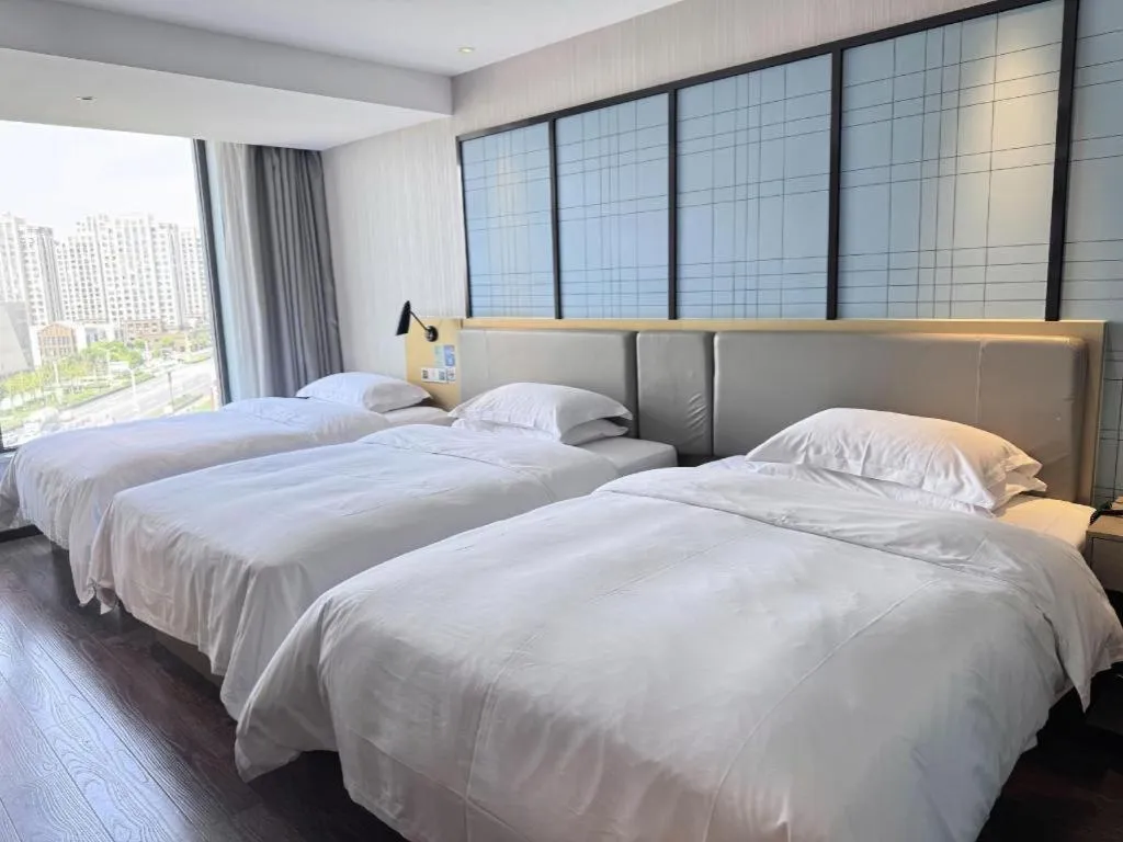 Bed in Echarm Hotel Huzhou Wuyue Plaza Children's Clothing City