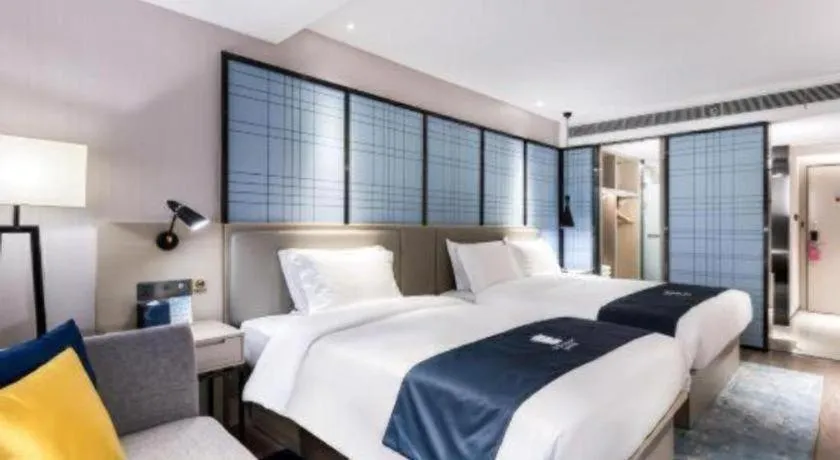 Bed in Echarm Hotel Huzhou Wuyue Plaza Children's Clothing City