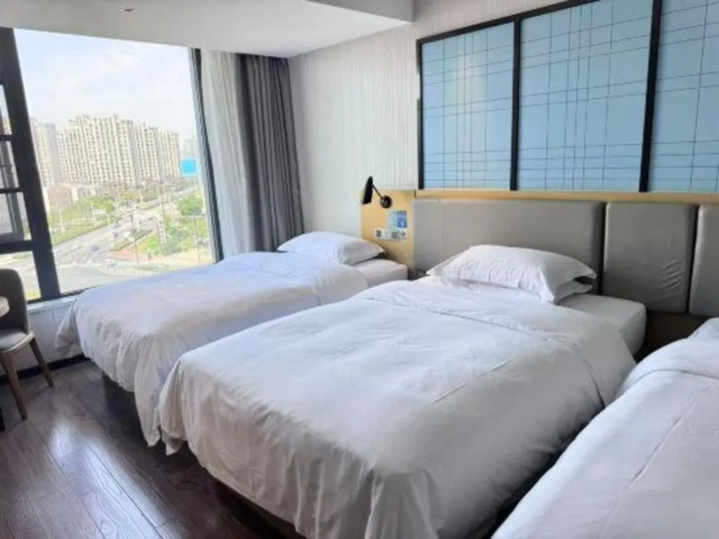 Bed in Echarm Hotel Huzhou Wuyue Plaza Children's Clothing City