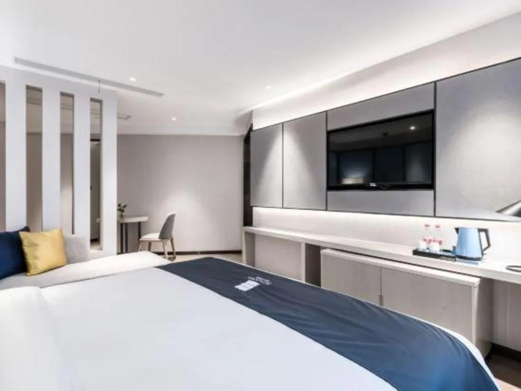 Bed in Echarm Hotel Huzhou Wuyue Plaza Children's Clothing City