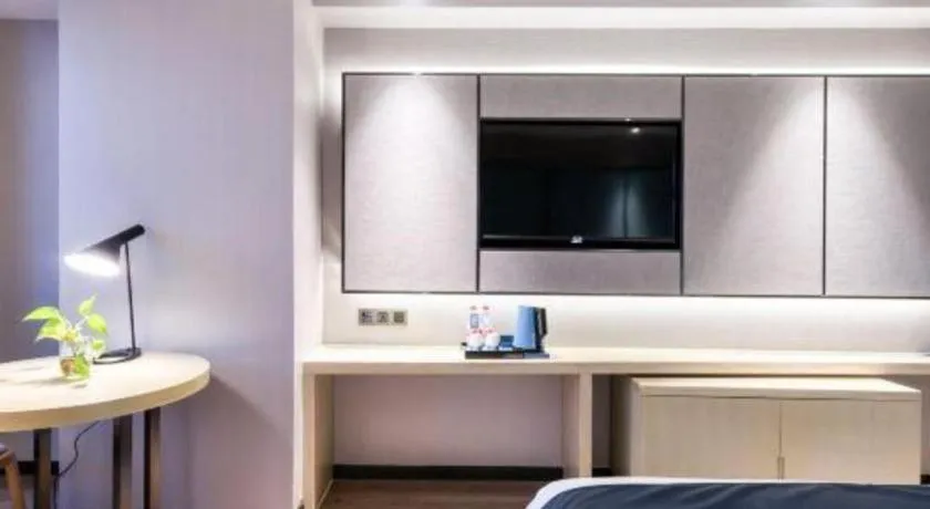 Bed in Echarm Hotel Huzhou Wuyue Plaza Children's Clothing City