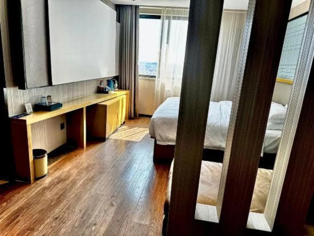 Bed in Echarm Hotel Huzhou Wuyue Plaza Children's Clothing City