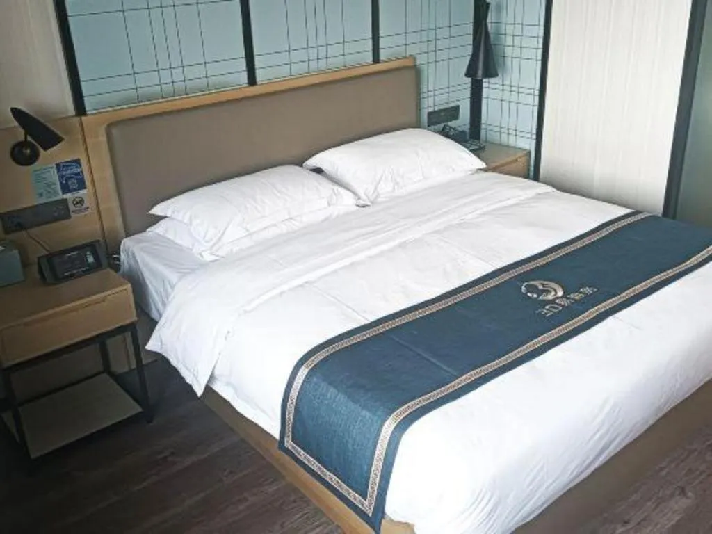 Bed in Echarm Hotel Huzhou Wuyue Plaza Children's Clothing City