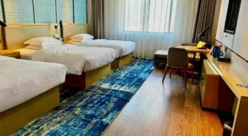 Bed in Echarm Hotel Huzhou Wuyue Plaza Children's Clothing City