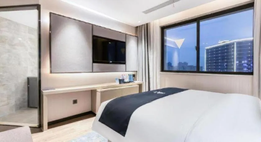 Bed in Echarm Hotel Huzhou Wuyue Plaza Children's Clothing City