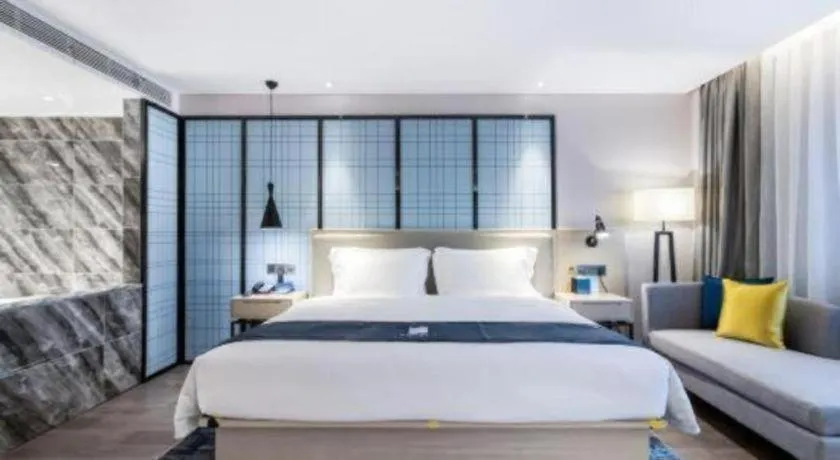 Bed in Echarm Hotel Huzhou Wuyue Plaza Children's Clothing City