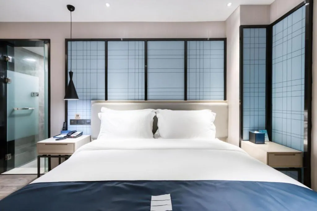 Bed in Echarm Hotel Huzhou Wuyue Plaza Children's Clothing City