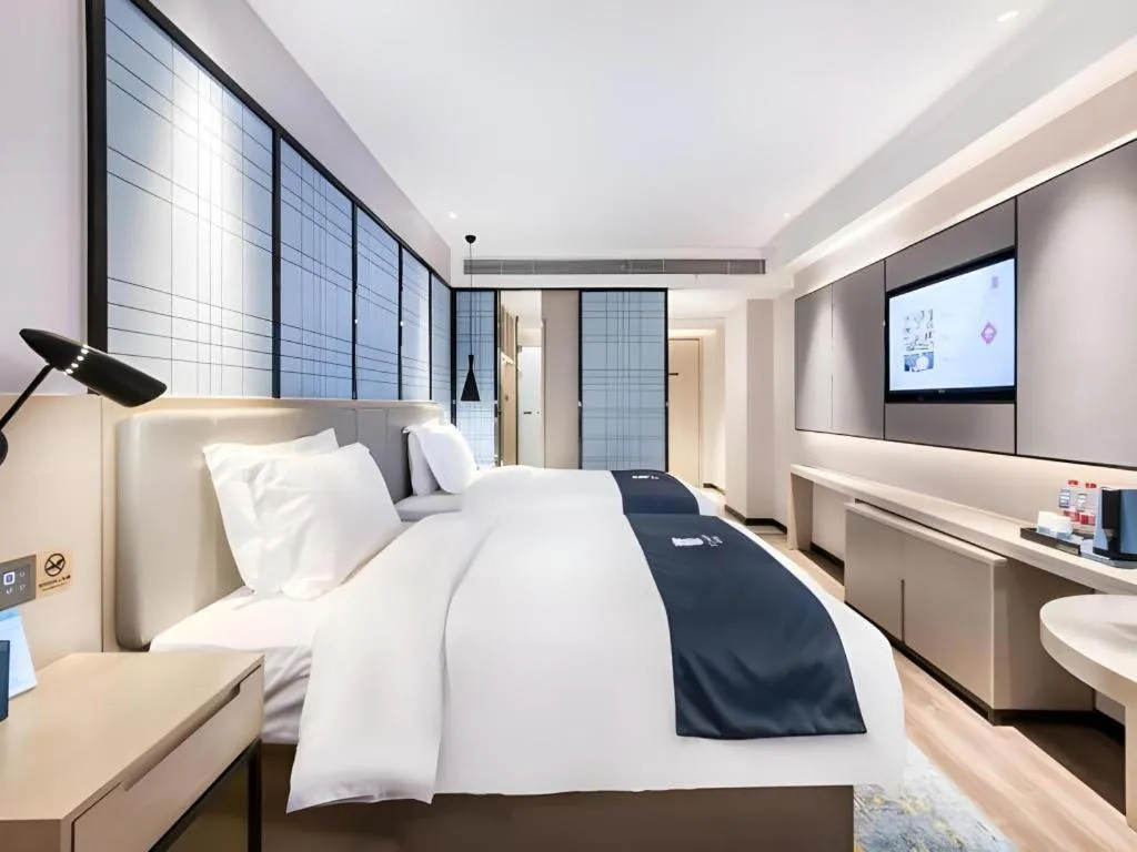 Bed in Echarm Hotel Huzhou Wuyue Plaza Children's Clothing City