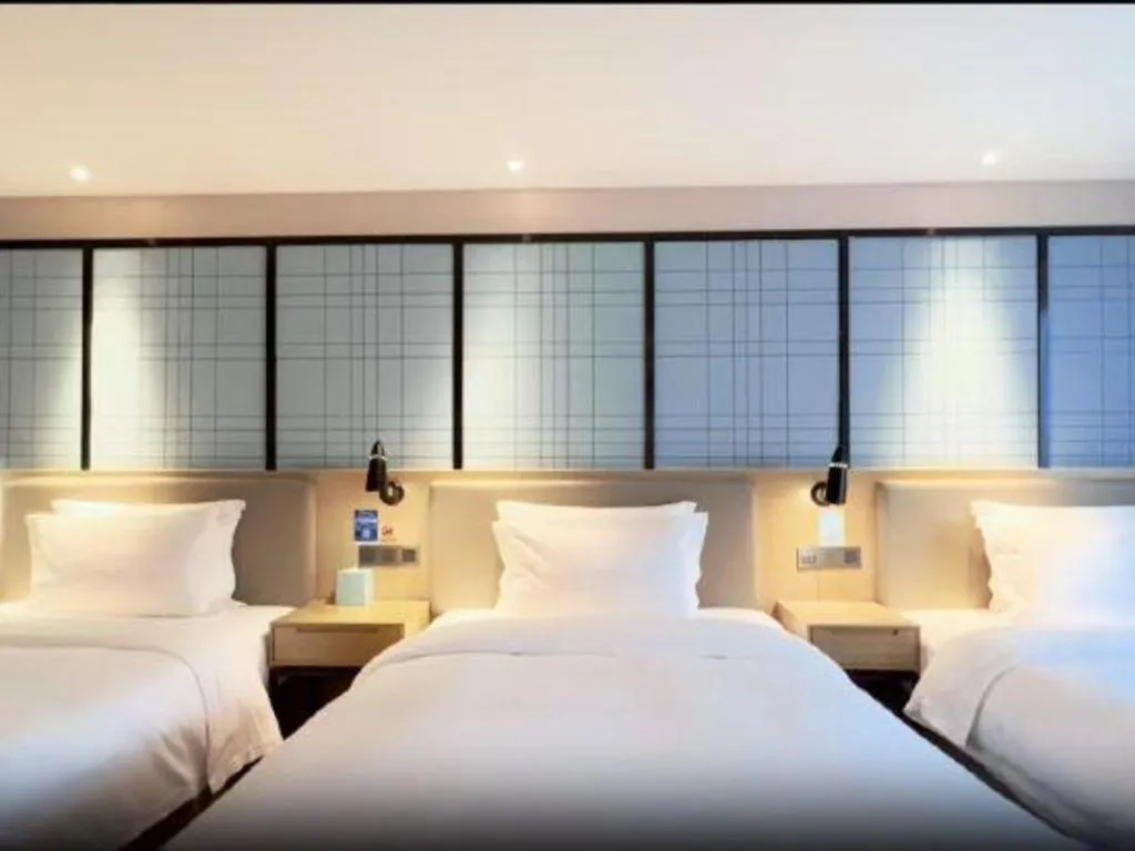 Bed in Echarm Hotel Huzhou Wuyue Plaza Children's Clothing City