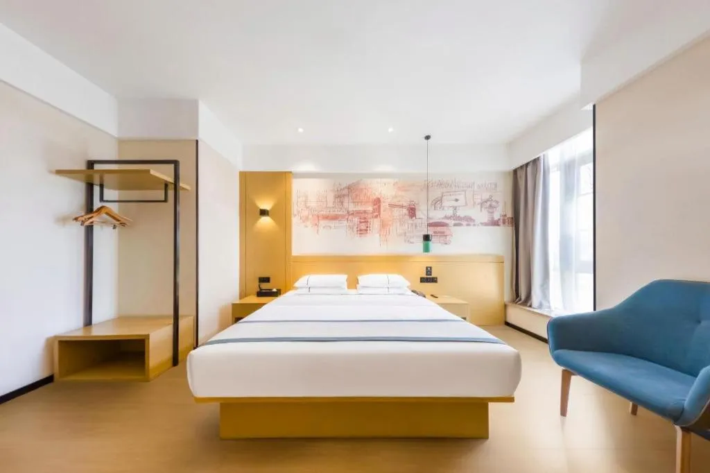 Bed in City Comfort Inn Kunming Flower City Midea Shuncheng Mansion