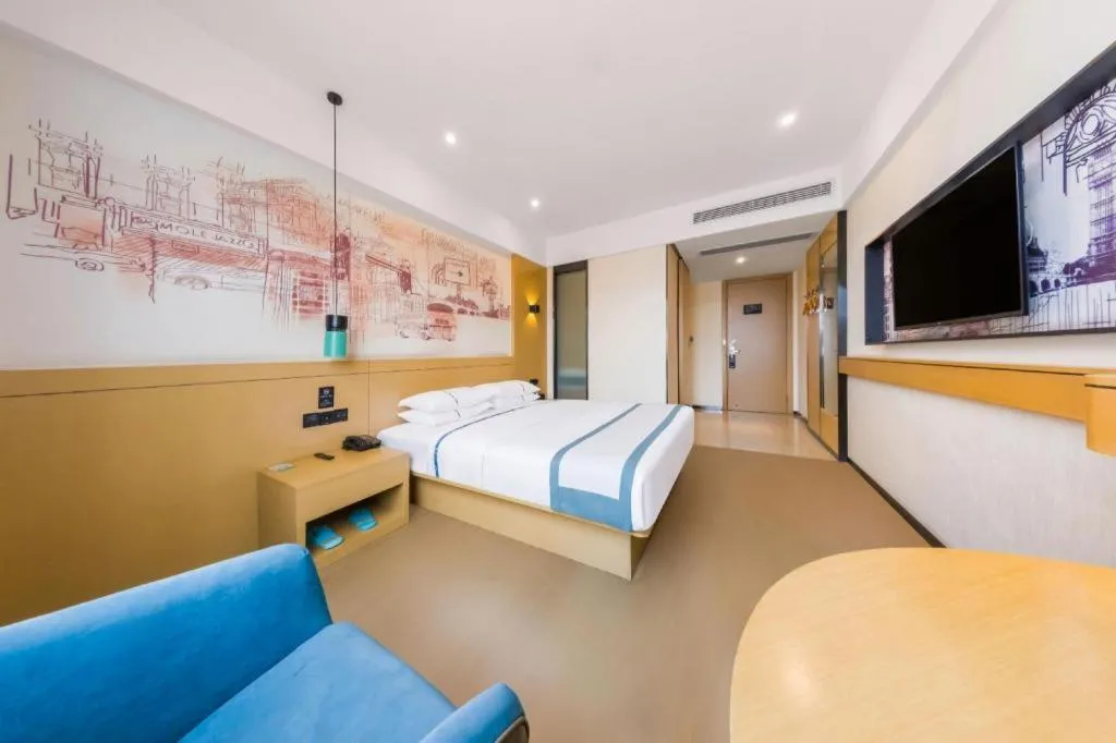 Bed in City Comfort Inn Kunming Flower City Midea Shuncheng Mansion