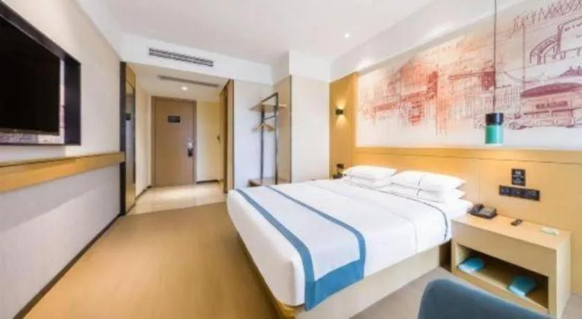 Bed in City Comfort Inn Kunming Flower City Midea Shuncheng Mansion