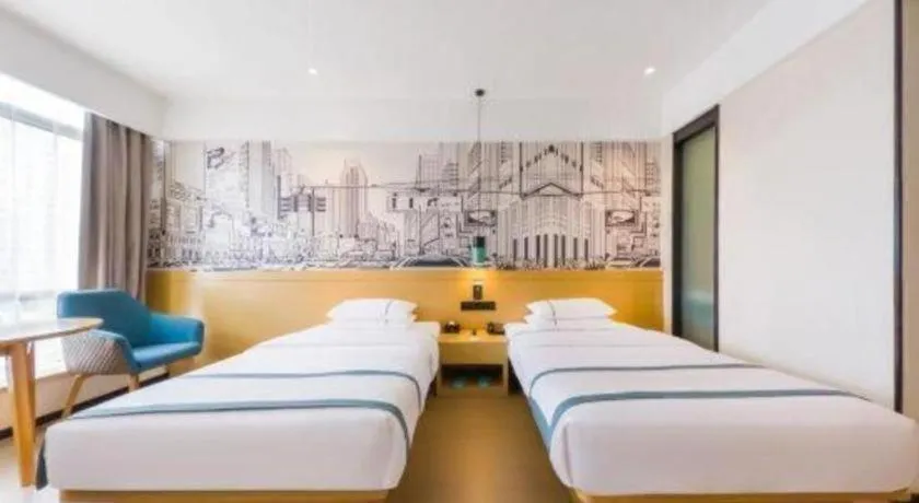 Bed in City Comfort Inn Kunming Flower City Midea Shuncheng Mansion