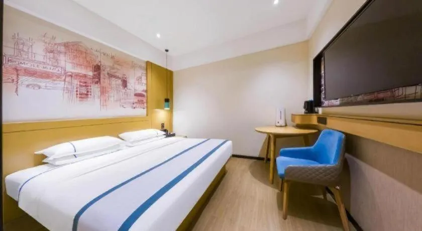 Bed in City Comfort Inn Kunming Flower City Midea Shuncheng Mansion