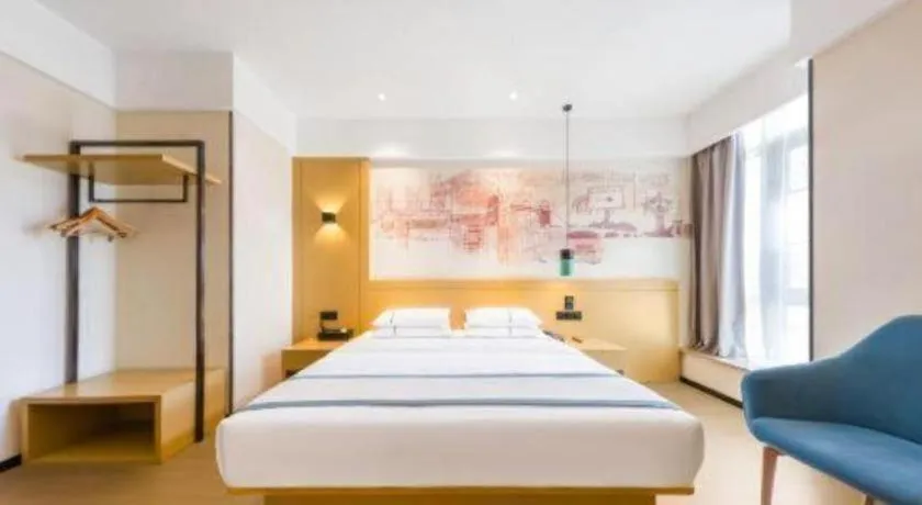 Bed in City Comfort Inn Kunming Flower City Midea Shuncheng Mansion