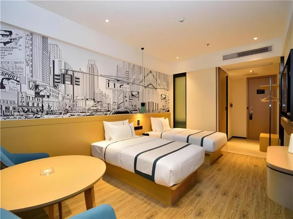 Bed in City Comfort Inn Kunming Flower City Midea Shuncheng Mansion