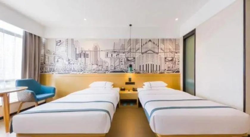 Bed in City Comfort Inn Kunming Flower City Midea Shuncheng Mansion