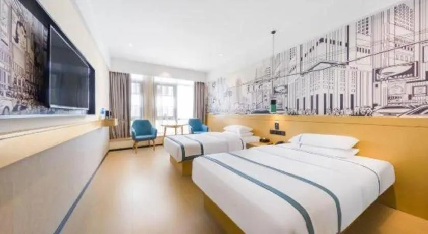 Bed in City Comfort Inn Kunming Flower City Midea Shuncheng Mansion