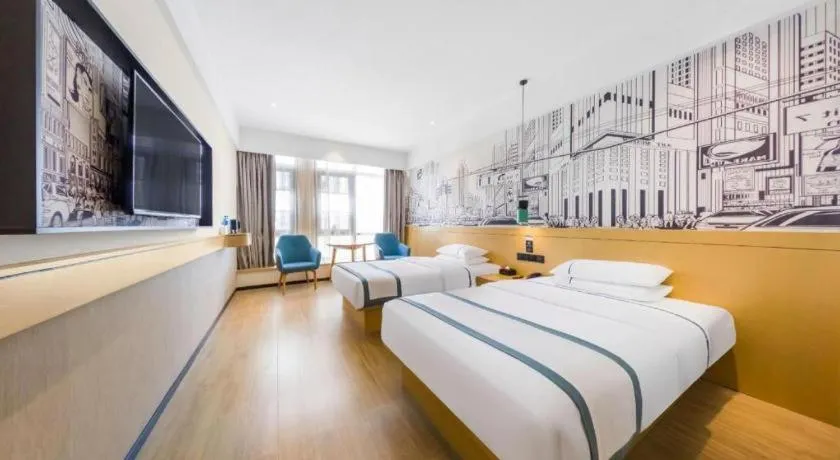 Bed in City Comfort Inn Kunming Flower City Midea Shuncheng Mansion