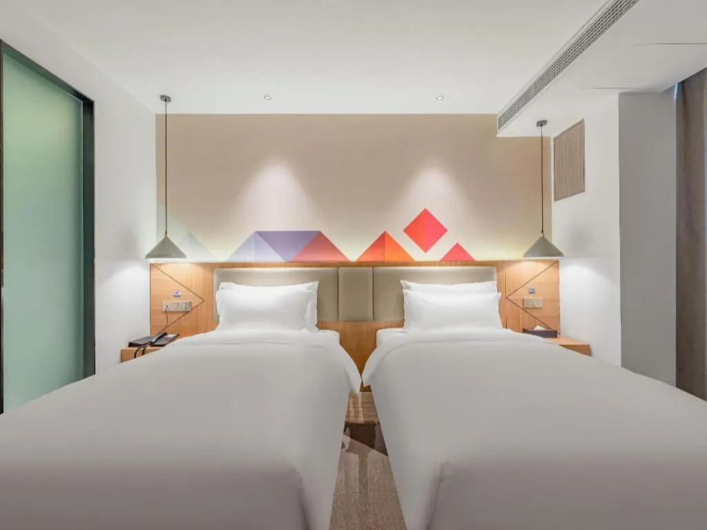 Bed in Borrman Hotel Jining Rencheng District Government Zhongde Plaza