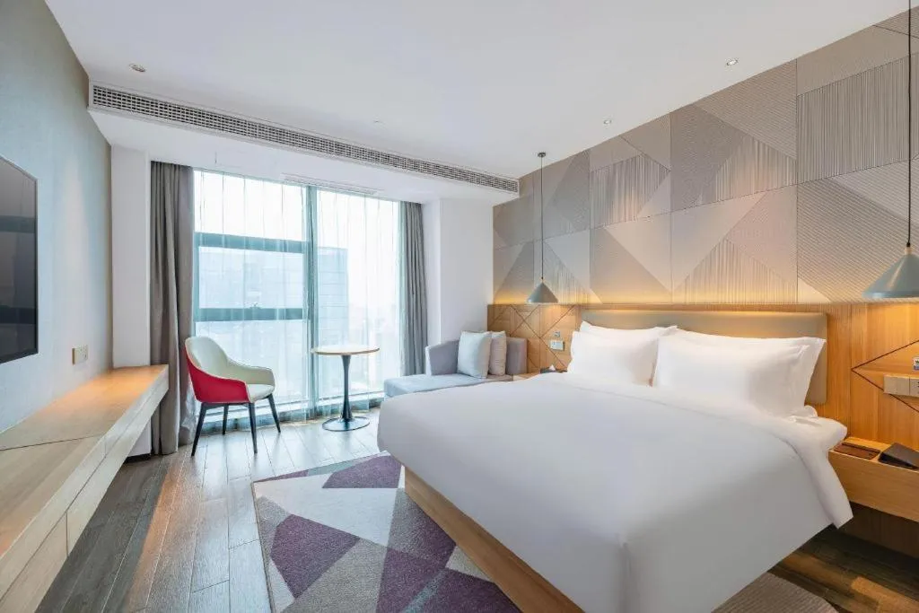 Bed in Borrman Hotel Jining Rencheng District Government Zhongde Plaza