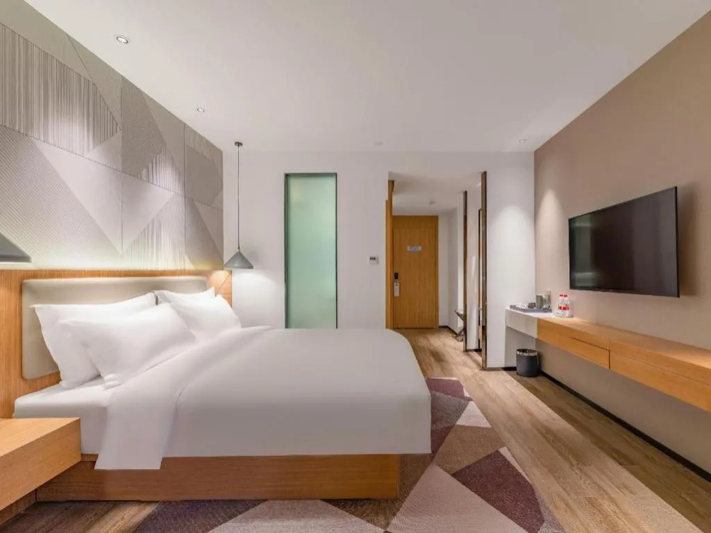 Bed in Borrman Hotel Jining Rencheng District Government Zhongde Plaza