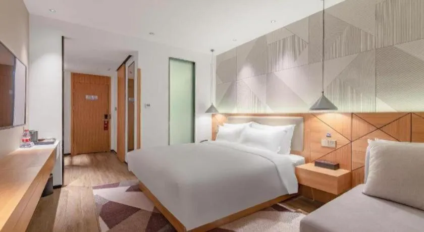 Bed in Borrman Hotel Jining Rencheng District Government Zhongde Plaza