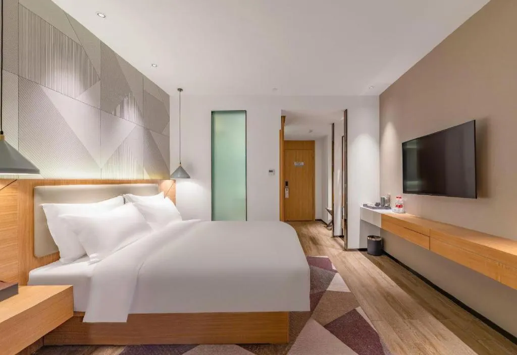 Bed in Borrman Hotel Jining Rencheng District Government Zhongde Plaza