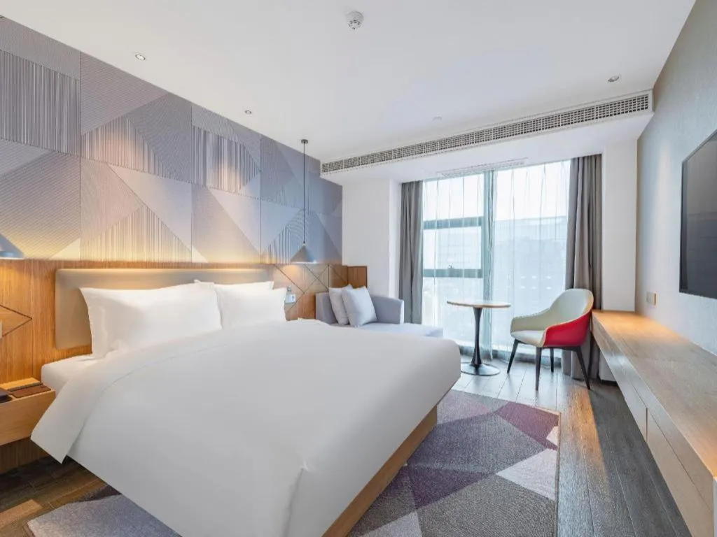 Bed in Borrman Hotel Jining Rencheng District Government Zhongde Plaza