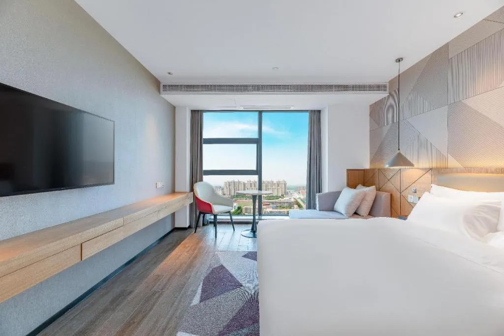 Bed in Borrman Hotel Jining Rencheng District Government Zhongde Plaza