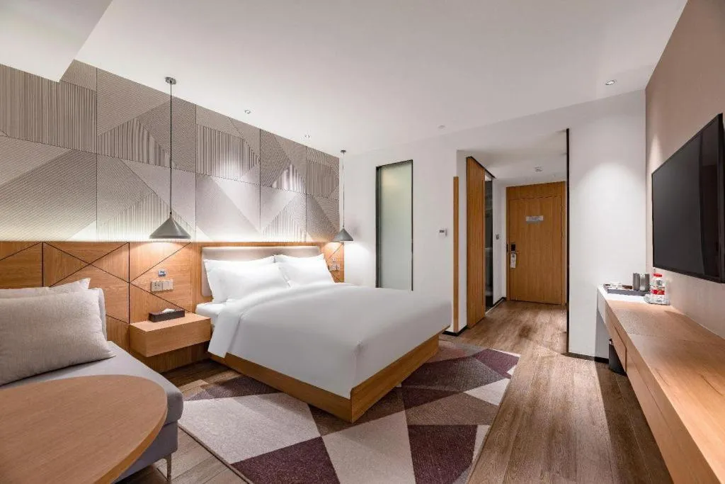 Bed in Borrman Hotel Jining Rencheng District Government Zhongde Plaza