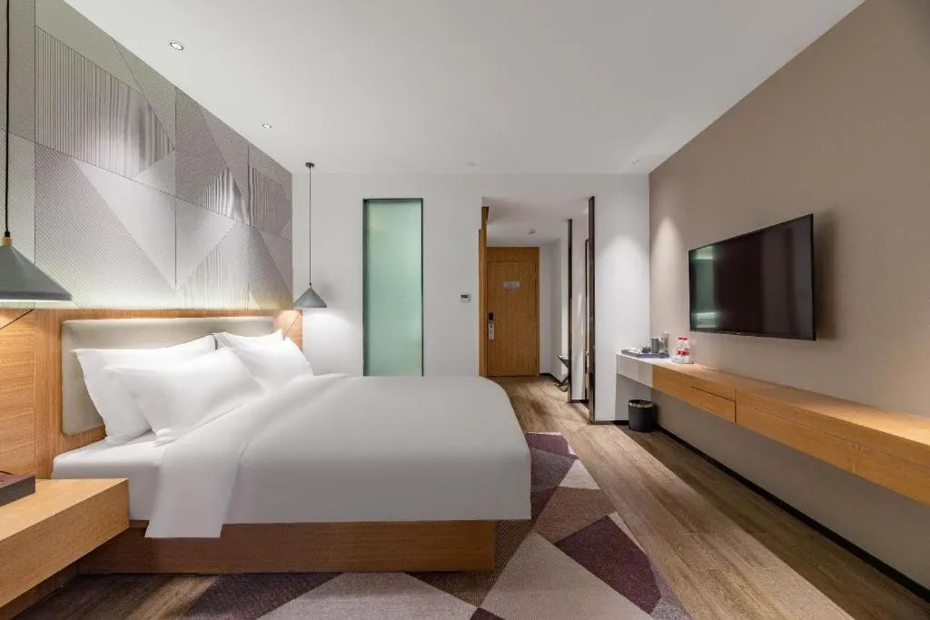 Bed in Borrman Hotel Jining Rencheng District Government Zhongde Plaza