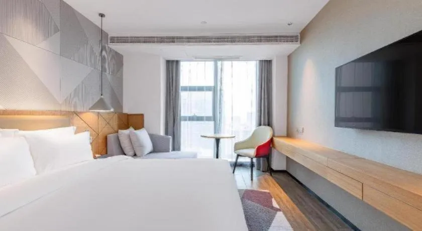 Bed in Borrman Hotel Jining Rencheng District Government Zhongde Plaza