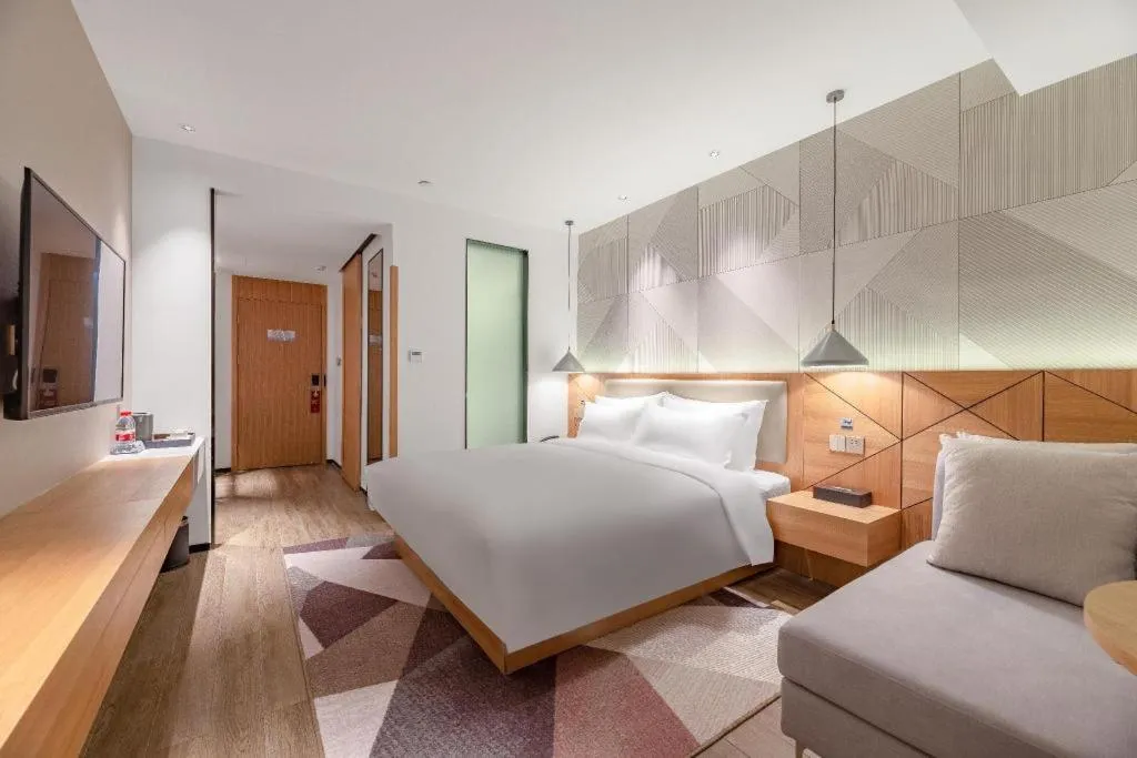 Bed in Borrman Hotel Jining Rencheng District Government Zhongde Plaza