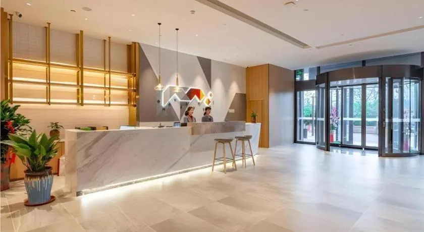 Bed in Borrman Hotel Jining Rencheng District Government Zhongde Plaza