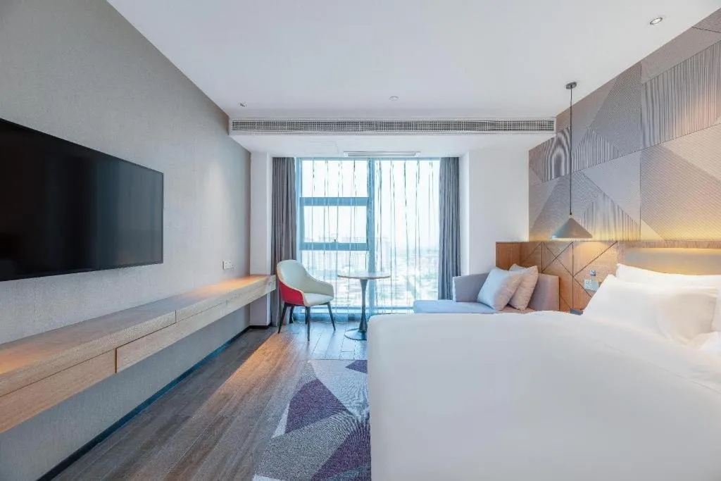 Bed in Borrman Hotel Jining Rencheng District Government Zhongde Plaza