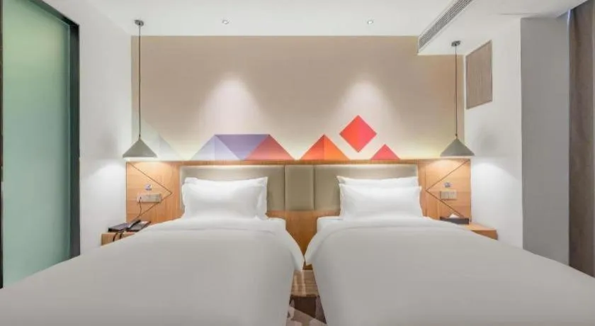 Bed in Borrman Hotel Jining Rencheng District Government Zhongde Plaza