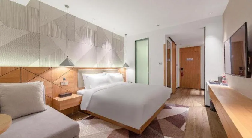 Bed in Borrman Hotel Jining Rencheng District Government Zhongde Plaza