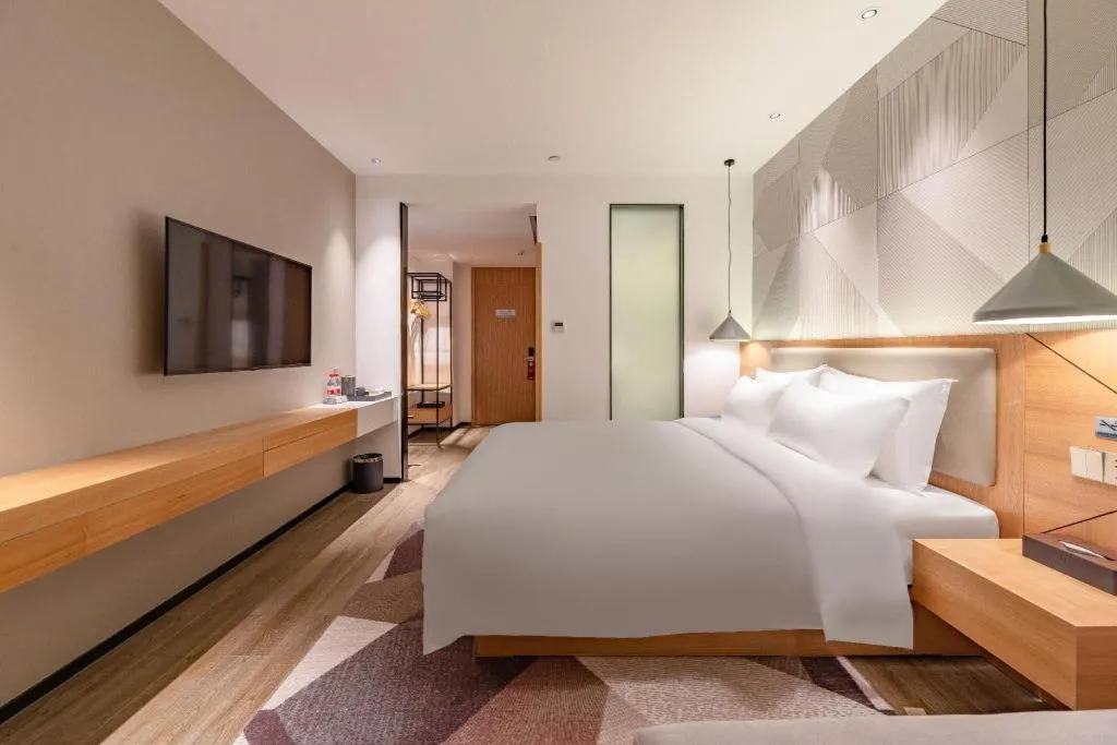 Bed in Borrman Hotel Jining Rencheng District Government Zhongde Plaza