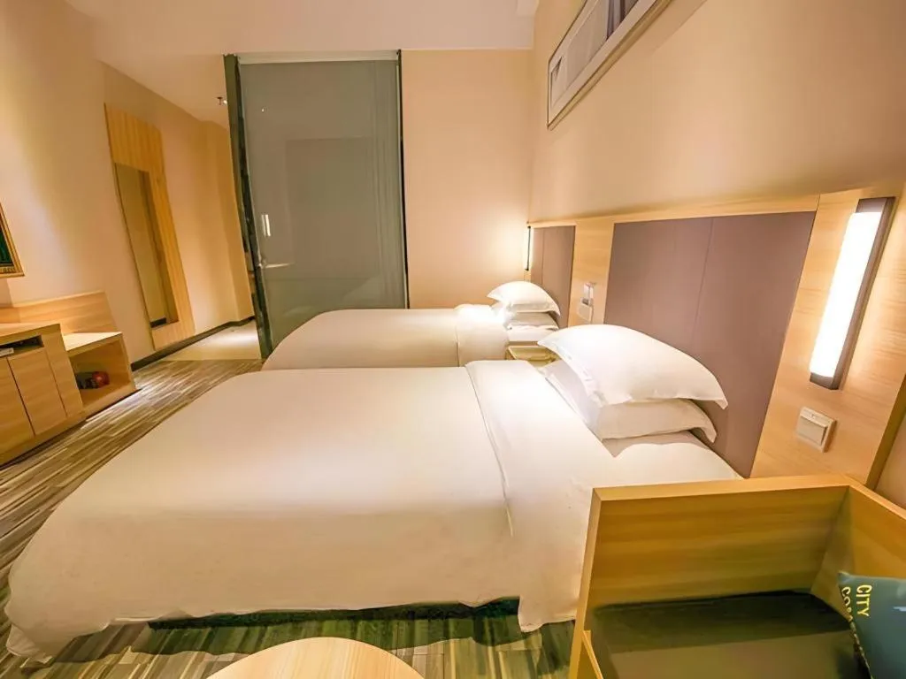 Bed in City Comfort Inn Yangjiang Yangxi Renmin Road Triumph Plaza