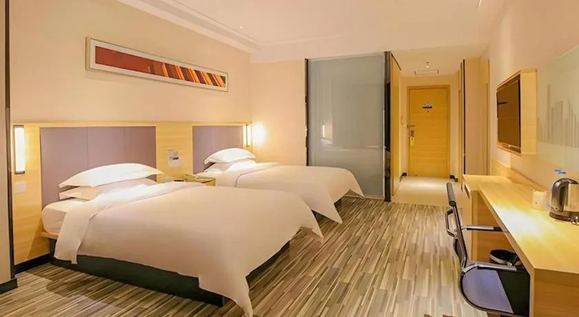 Bed in City Comfort Inn Yangjiang Yangxi Renmin Road Triumph Plaza